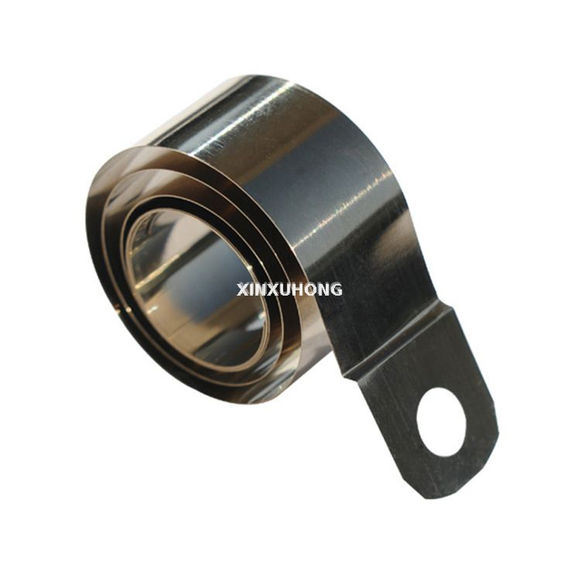 Variable Force Spring for Corrugated Paper Display Racks