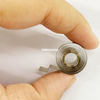 Variable Force Springs for Corrugated Paper Display Racks